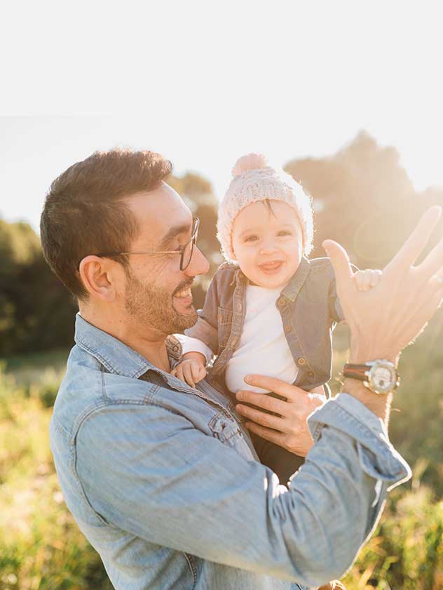 Dad high-fiving his baby