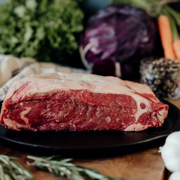 raw beef loin on skillet
