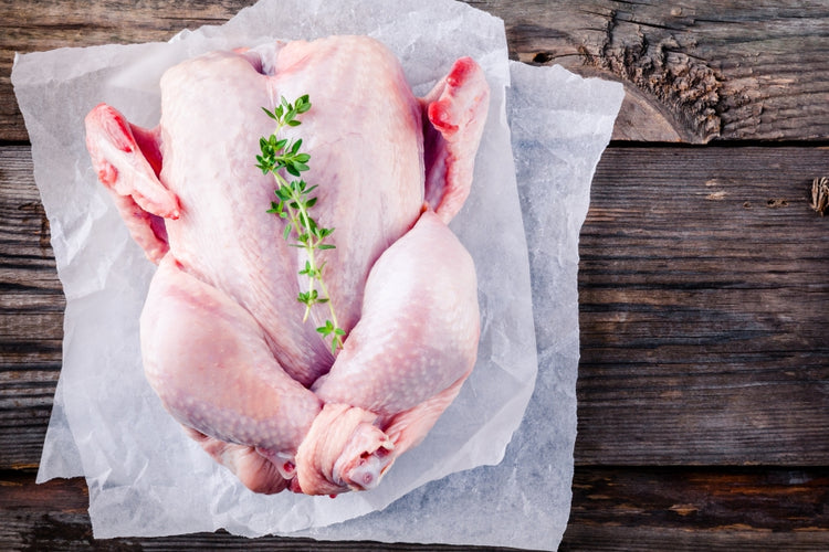 pastured whole chicken raw on wood