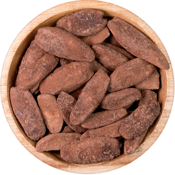 pili hunters nuts with raw cacao in a bowl