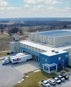 Distribution warehouse with FedEx lorries outside