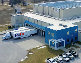 Distribution warehouse with FedEx lorries outside