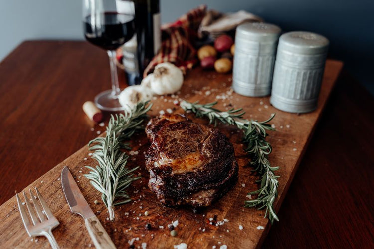 Grassfed Beef Ribeye Grilled on cutting board