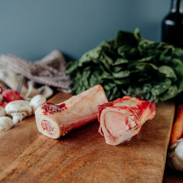 beef long marrow bones on table