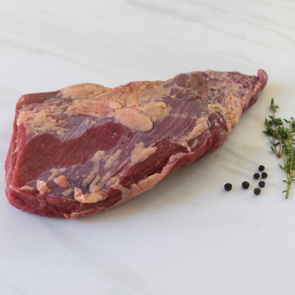 grassfed tri-tip roast on cutting board