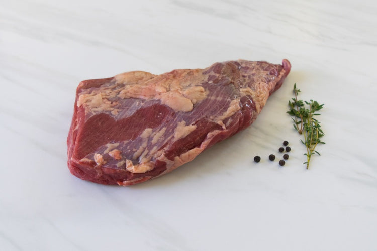 grassfed tri-tip roast on cutting board