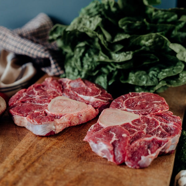 grassfed osso buco on plank