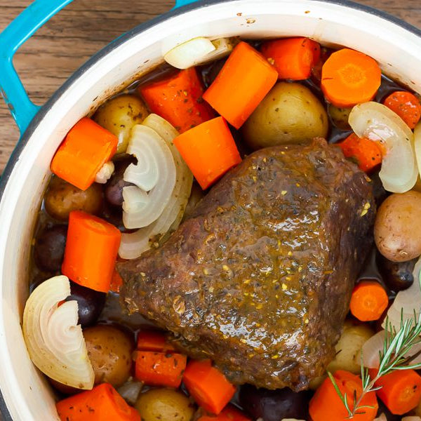 Precooked Pot Roast and Gravy with carrots, potatoes, onions