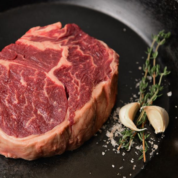 Grassfed Beef Ribeye in skillet