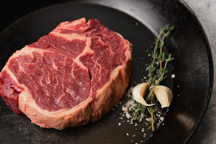 Grassfed Beef Ribeye in skillet