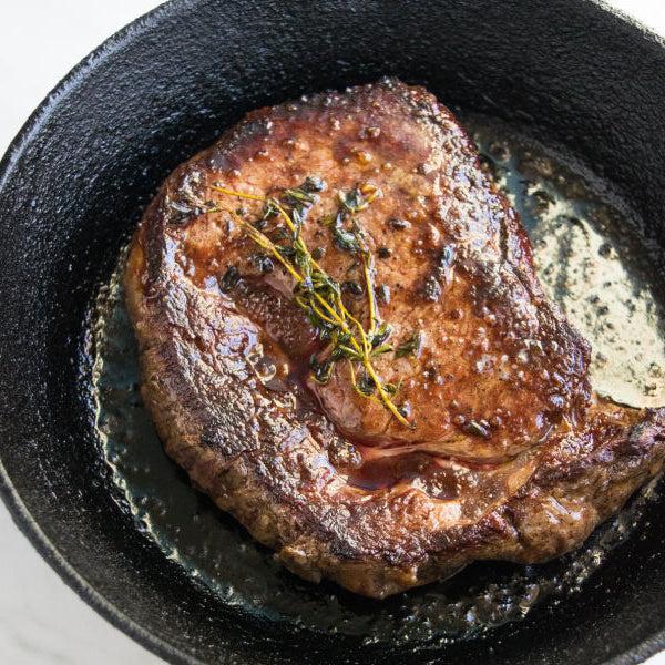 Grassfed Beef Ribeye in skillet