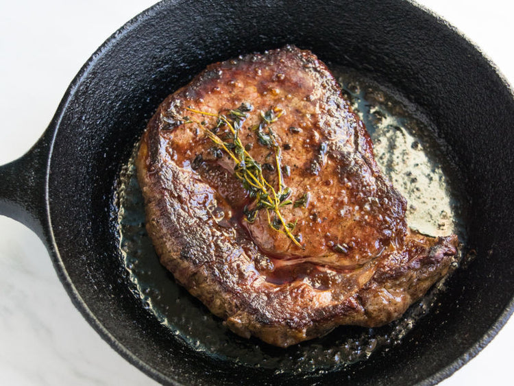 Grassfed Beef Ribeye in skillet