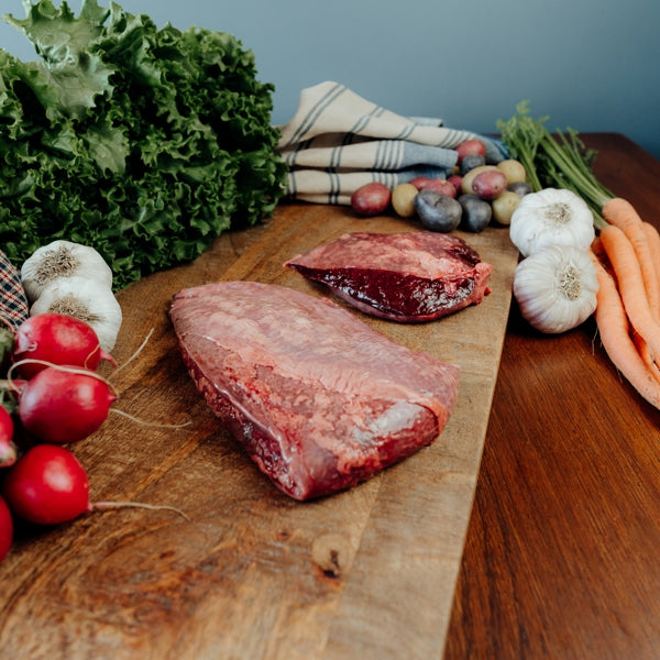 grassfed beef spleen on cutting board