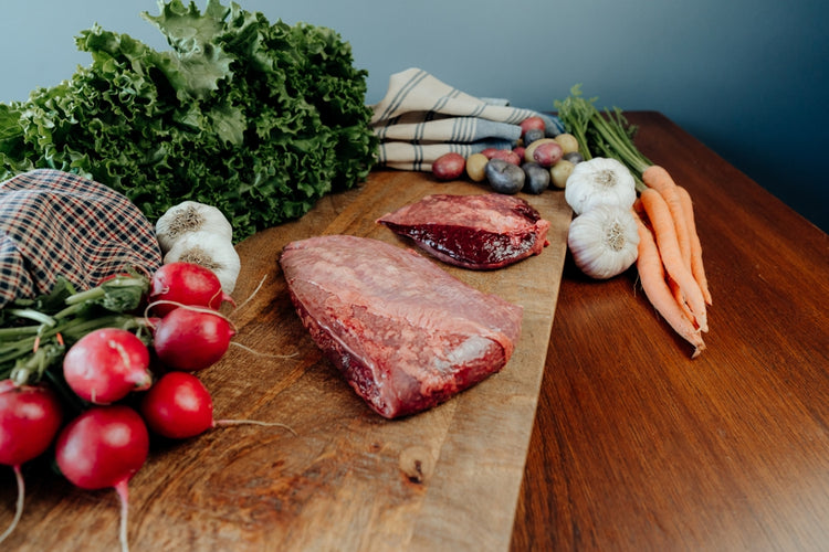 grassfed beef spleen on cutting board