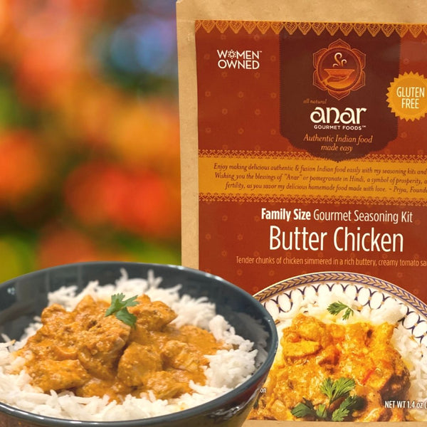 Anar Gourmet Foods Butter Chicken seasoning kit with a bowl of butter chicken and rice.