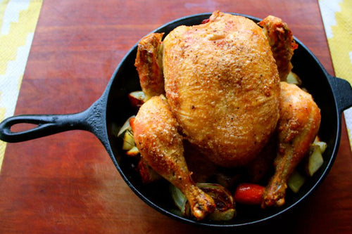 pasture-raised whole chicken roasted in cast iron pot
