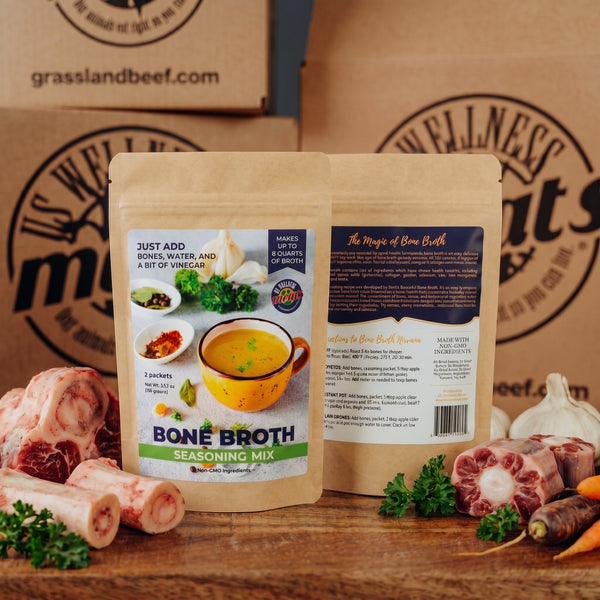 bone broth seasoning kit with bones, vegetables, and US Wellness Meats boxes in background