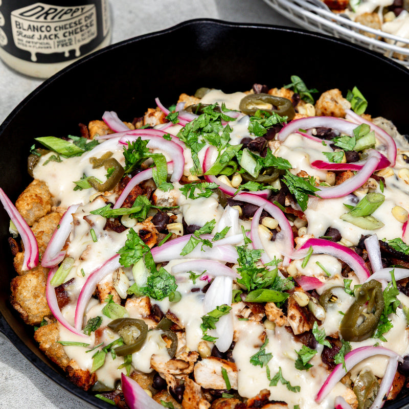 Loaded Tater Tot Skillet with BBQ Chicken and Queso
