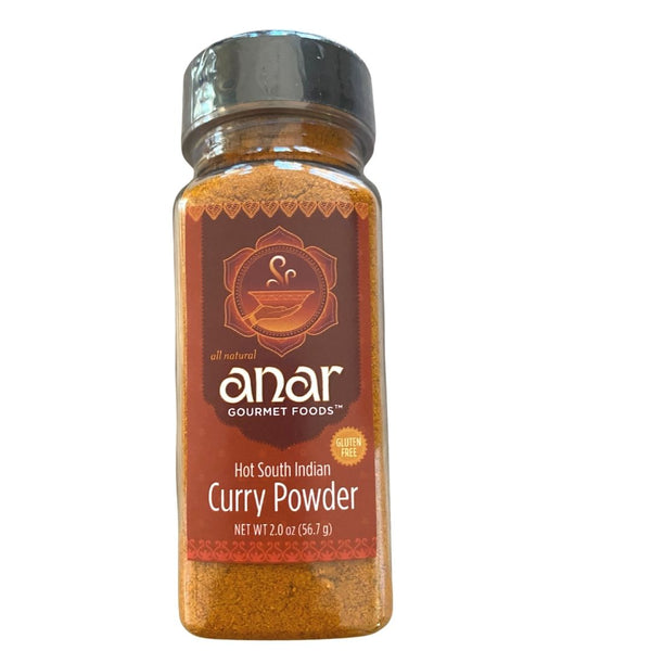 Bottle of Anar Gourmet Foods Hot South Indian Curry Powder on a white background