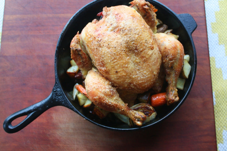 roasted whole chicken in cast iron pot