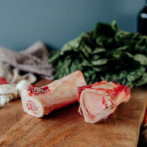 beef long marrow bones on table
