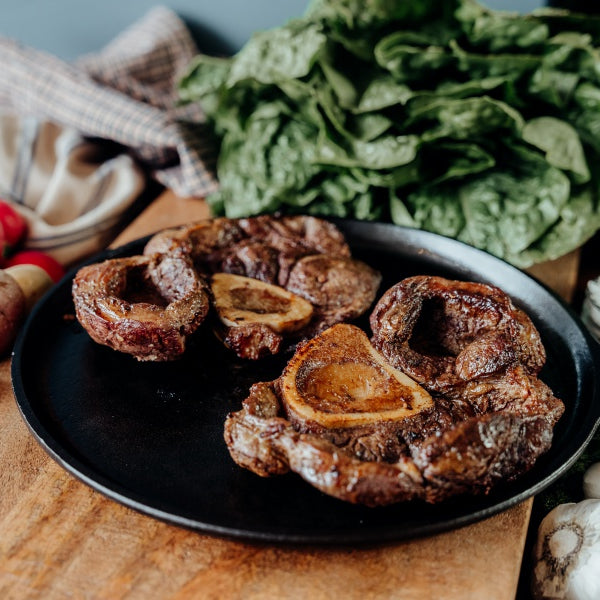 roasted grassfed beef osso buco on skillet