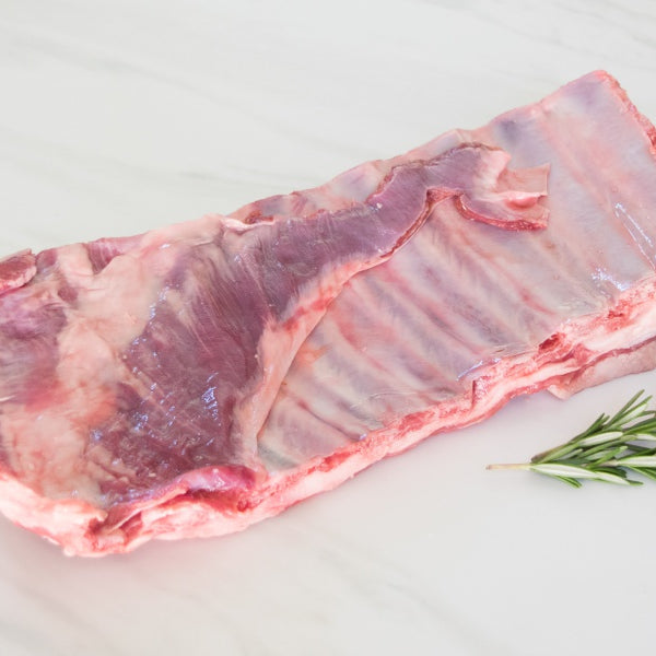 lamb spare ribs on cutting board